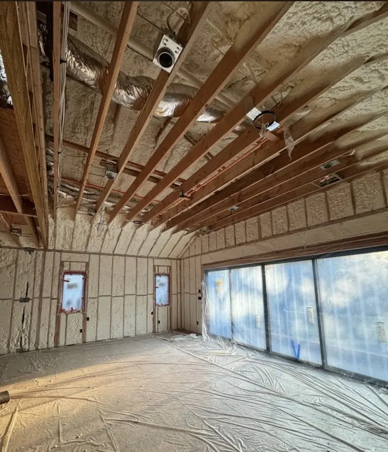 Interior walls and ceiling insulated with spray foam during new construction in Los Gatos